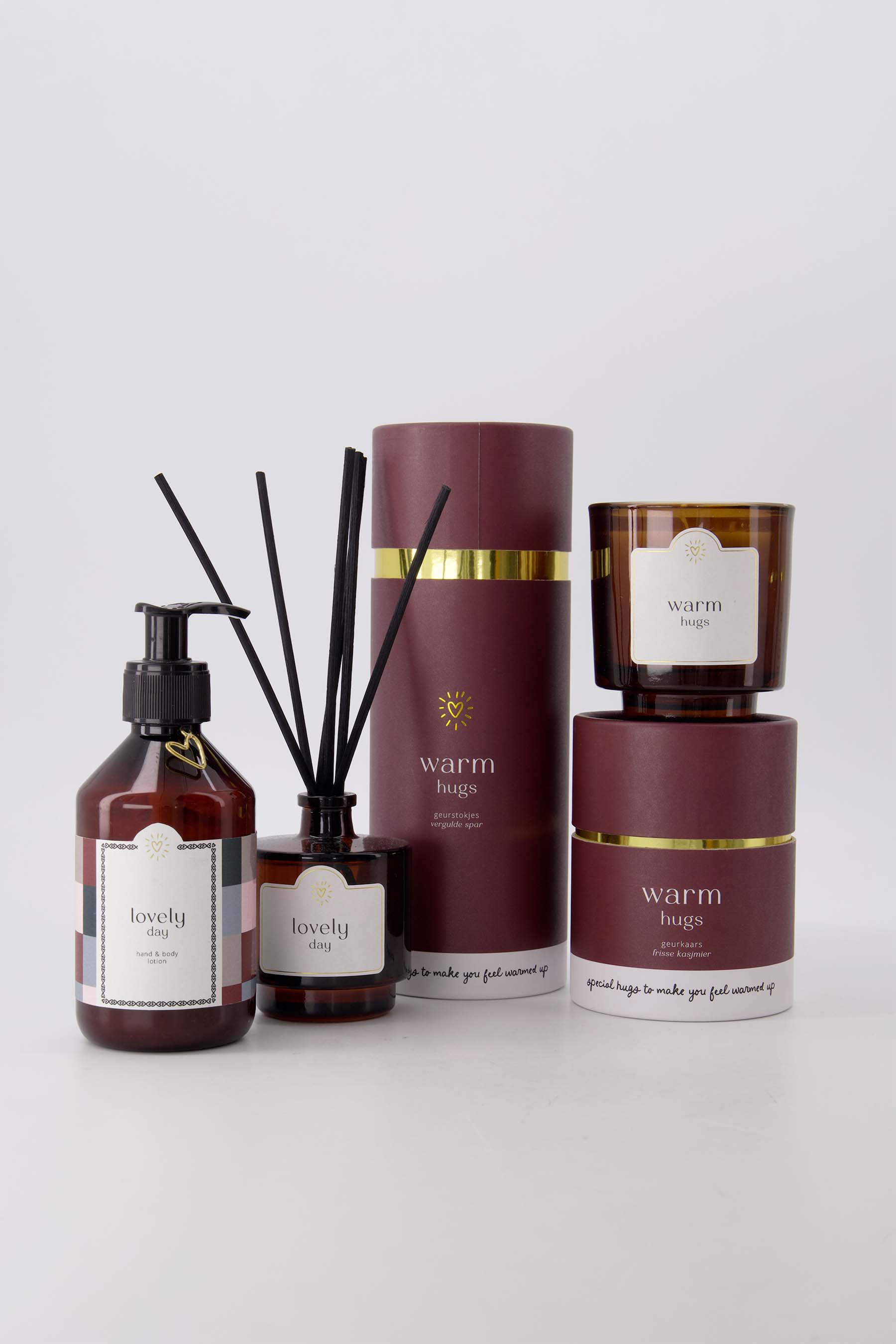 geurkaars glas in koker warm hugs donkerrrood