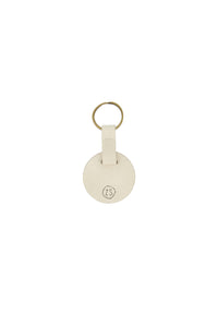 ronde sleutelhanger geniet