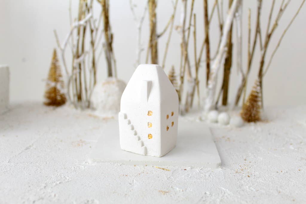 Kerstdecoratie: wit betonnen huis