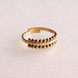 R639: Steel adjustable ring with dotted edge - gold