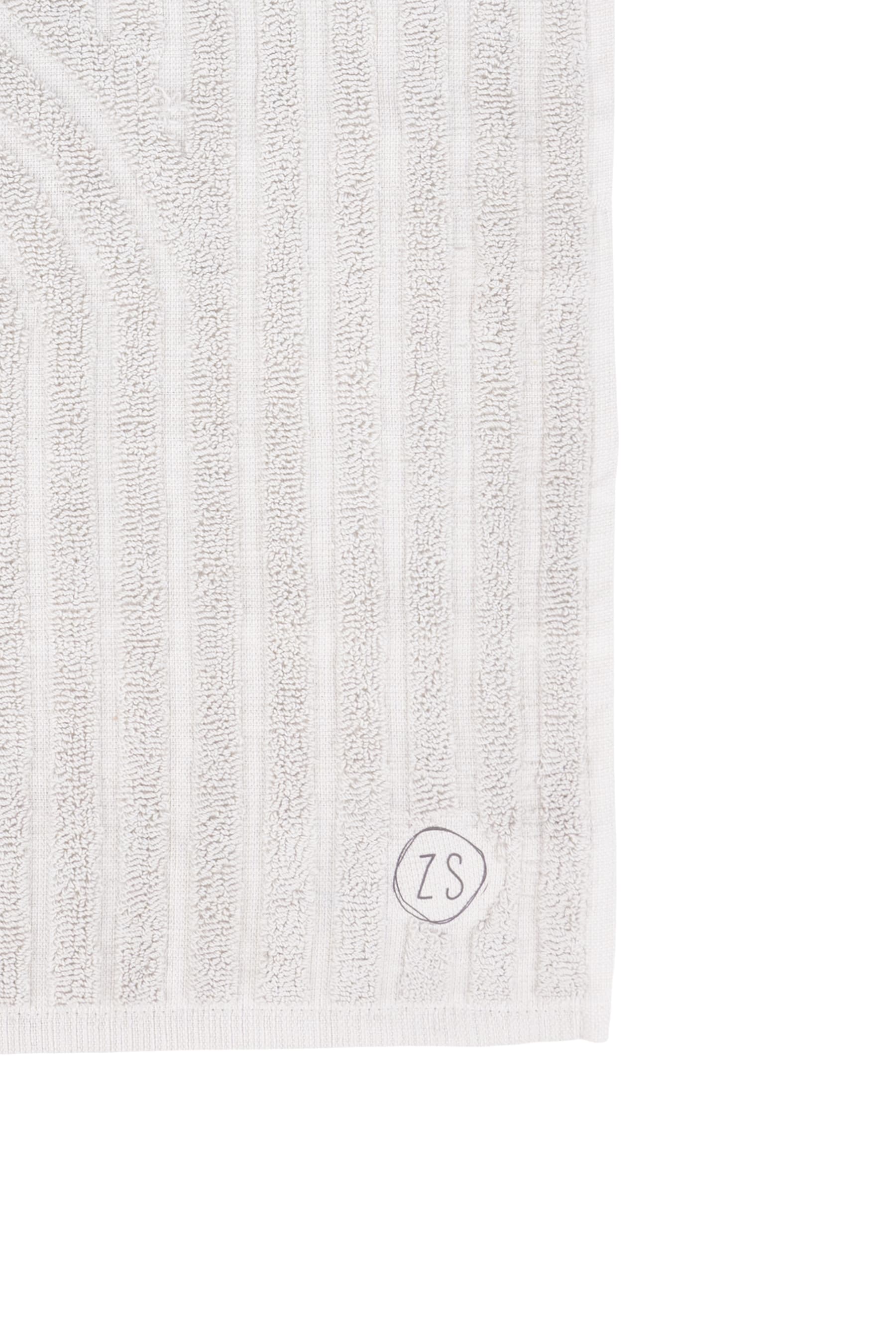 Handdoek bogen, Zand