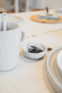 Schaaltje met ribbels zand